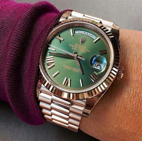 rose gold rolex green face